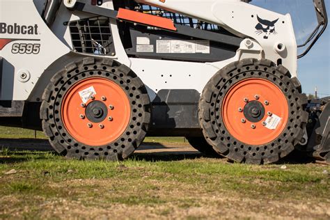 turf tires for skid steer|skid steer tire depth.